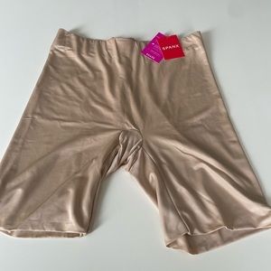 Spank Power Conceal Her mid-thigh short. NWT
